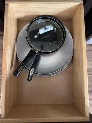 a wooden box with a plate and utensils at Walk everywhere heart Gaslamp in San Diego