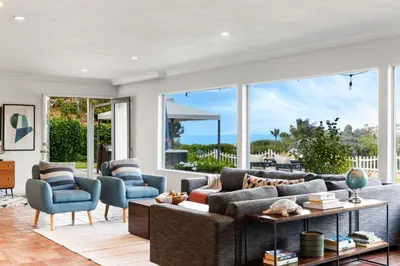 a living room with a couch and chairs at Ocean View Retreat Firepit & Spacious Yard in San Diego