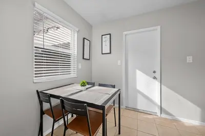a dining room with a table and chairs at Prime North Park Stay, Walk to Restaurants, Bars, and Breweries with Free Parking in San Diego