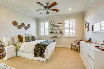 a bedroom with a bed and a ceiling fan at Outdoor Oasis! Luxe Hilltop Home in San Marcos in San Marcos