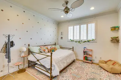 a bedroom with a bed and a ceiling fan at Outdoor Oasis! Luxe Hilltop Home in San Marcos in San Marcos