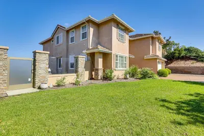 a large house with a lawn in front of it at Outdoor Oasis! Luxe Hilltop Home in San Marcos in San Marcos