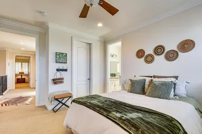 a bedroom with a bed and a ceiling fan at Outdoor Oasis! Luxe Hilltop Home in San Marcos in San Marcos