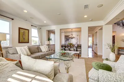 a living room with a couch and a table at Outdoor Oasis! Luxe Hilltop Home in San Marcos in San Marcos