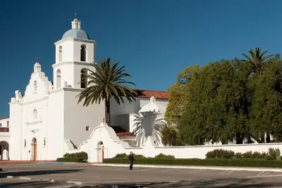 a man standing in front of a white church at Retro Star-Wagon, Ocean View at Studios in Oceanside