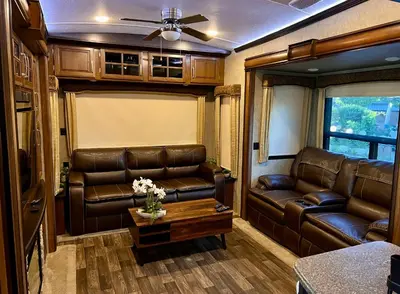 a living room with a couch and a table at Rancho CA 78 in Aguanga