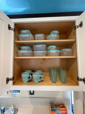 a cupboard filled with bowls and plates and cups at Catch of the Day Pet-Friendly El Pescador 1 Block from the Beach in San Diego