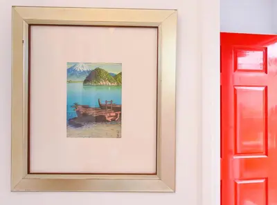 a framed picture of a picture of a lake at Charming Garden Cottage with Full Kitchen Walk to La Jolla Village & Beaches in San Diego