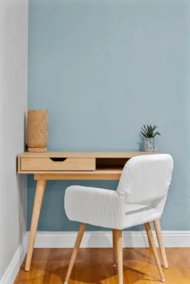 a wooden desk with a chair next to a wall at Travelers Dream Home SDSU Hot Tub Pool Table in San Diego