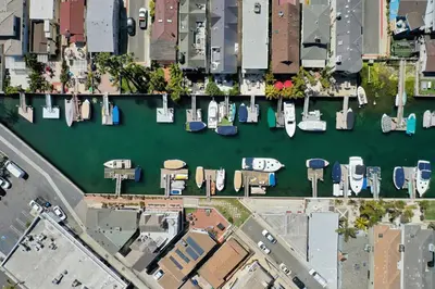 an overhead view of a marina with boats in it at 4 Car Parking Steps 2 Lido Village Marina Phenomenal Location in Newport Beach