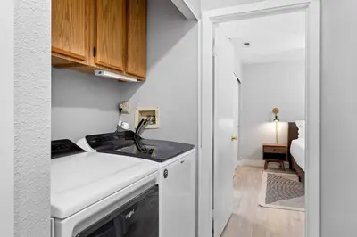a kitchen with a sink and a counter top at Lux Modern Pet Friendly | Pool | Hot Tub | Tennis in Oceanside