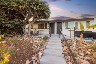 a house with a walkway in front of it at Central Location Balboa Park Villa in San Diego