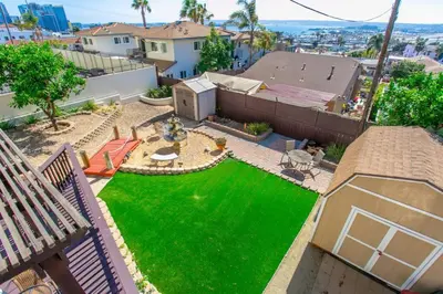 an aerial view of a backyard with a green lawn at Great Views Studio apartment near Little Italy in San Diego