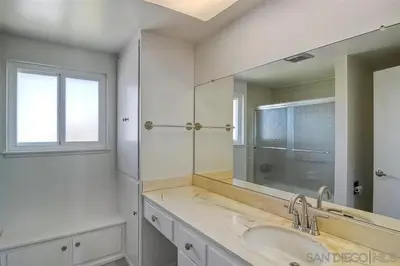a bathroom with a sink and a large mirror at Guest Suite Northern San Diego Great Price in Rancho Bernardo