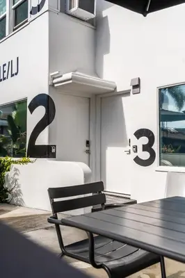 a bench sitting in front of a building at Simple La Jolla Epic bungalow #1 in San Diego