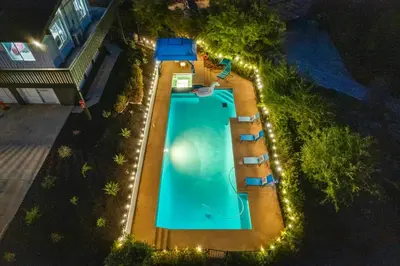 an overhead view of a swimming pool with lights at Entire Private Home with 4 Bedrooms 3 Bathrooms, Big Yard, View, , King Bed, 10 Parking, Available Now in El Cajon