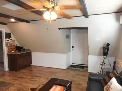 a living room with a ceiling fan and a couch at Historic Gold Town Loft A-Frame 1 Bedroom with sofa sleeper WIFI in Julian
