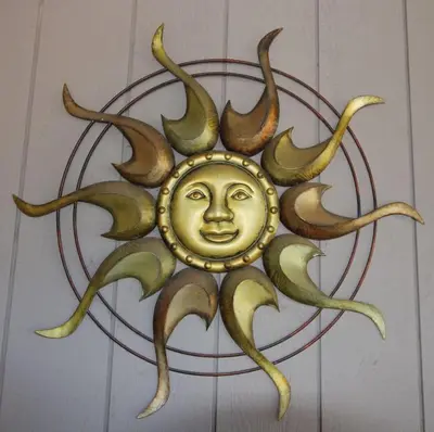 a metal sun with a face in the middle at Temecula Wine Country Ranch with 200 year old oaks in Temecula
