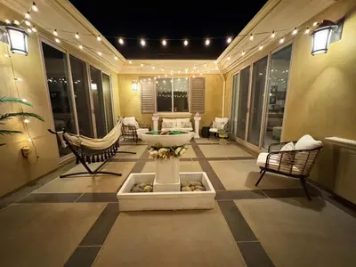 a large room with a fountain in the middle of a room at Vineyard Vista Retreat in Temecula