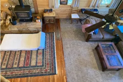 an aerial view of a living room with a ceiling fan at Cozy Cabin Hot Tub Sauna Fireplace in Palomar Mountain