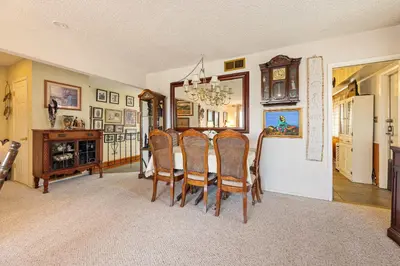 a dining room with a table and chairs at A Visit to Grandma's House in San Diego