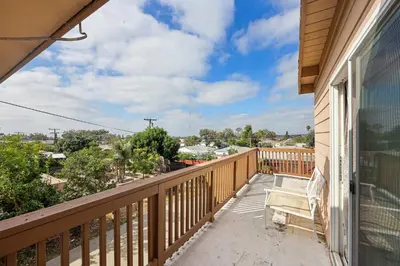 a balcony with a view of a city at Stay at Grandmas Entire Home with Yard & Balcony in San Diego