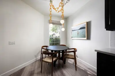 a dining room with a table and two chairs at Newport Coast Bungalow in Newport Beach