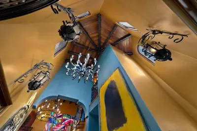 an overhead view of a room with a chandelier at Skyline and Bay Views Spanish Villa Pool and Hot Tub in San Diego