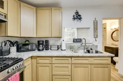 a kitchen with a sink and a stove top oven at Modern Backcountry Retreat! Bike and Hike Mt Laguna in Mount Laguna