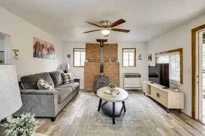 a living room with a couch and a fireplace at Modern Backcountry Retreat! Bike and Hike Mt Laguna in Mount Laguna