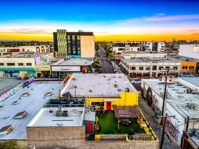 an aerial view of a city at sunset at Historic Apartment with Roof Deck in the Heart of North Park in San Diego