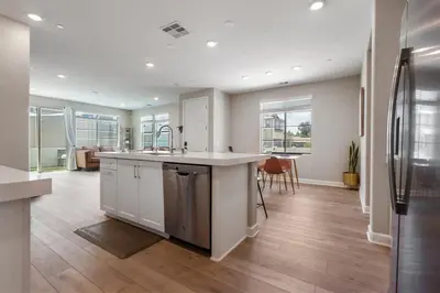 a kitchen with a sink and a counter top at Family home with Private Gym in Escondido