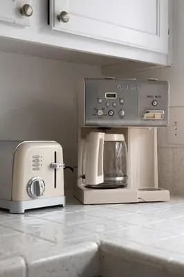 a microwave and a coffee maker on a kitchen counter at Walk to beach Great location Villa in San Diego