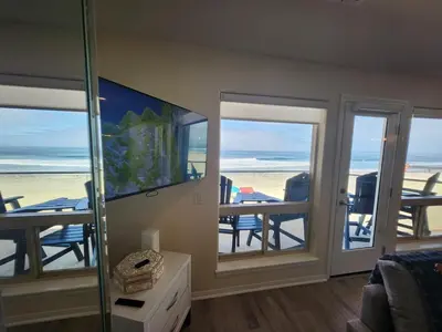 a living room with a view of the beach at Modern Coastal Escape Breathtaking Ocean in Imperial Beach