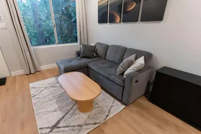 a living room with a couch and a coffee table at Relaxing Retreat in North Park in San Diego
