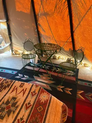 two chairs and a table in a tent at Mystic Canyon Inn Bed & Breakfast in El Cajon