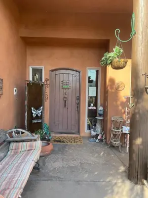 a front door of a house with a purple door at Mystic Canyon Inn Bed & Breakfast in El Cajon