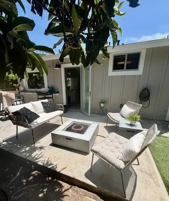 a patio with couches and chairs and a table at Entire home in La Jolla, CA in San Diego