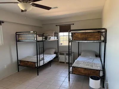 two bunk beds in a room with a ceiling at Hilltop Getaway with Sunset Views in Temecula
