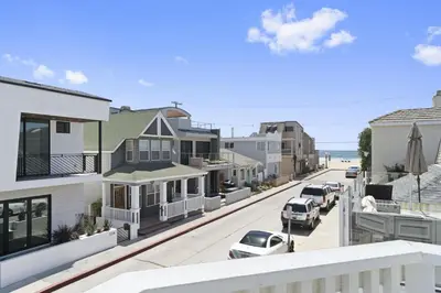 an aerial view of a street with houses and cars at 6Br Oceanview Getaway Steps From 27Th St Beach By Beachview Rentals in Newport Beach