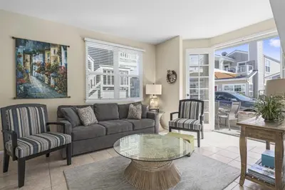 a living room with a couch and chairs and a table at 6Br Oceanview Getaway Steps From 27Th St Beach By Beachview Rentals in Newport Beach