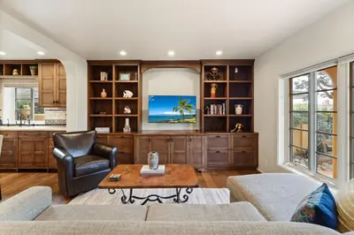 a living room with a couch and a table at Majestic Corner Coastal Haven in San Diego