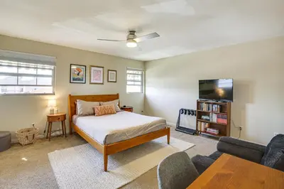 a bedroom with a bed and a tv and a couch at Easy Beach and Airport Access! San Diego Getaway in San Diego
