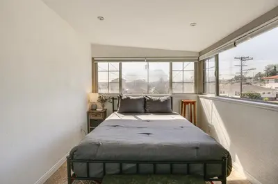 a bedroom with a bed in front of a window at Easy Beach and Airport Access! San Diego Getaway in San Diego
