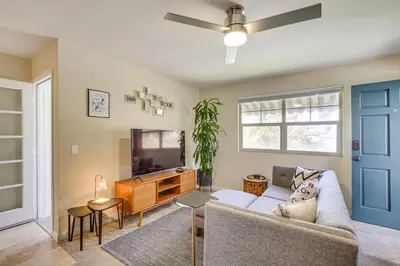 a living room with a couch and a tv at Easy Beach and Airport Access! San Diego Getaway in San Diego