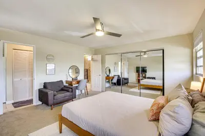a bedroom with a bed and a living room at Easy Beach and Airport Access! San Diego Getaway in San Diego