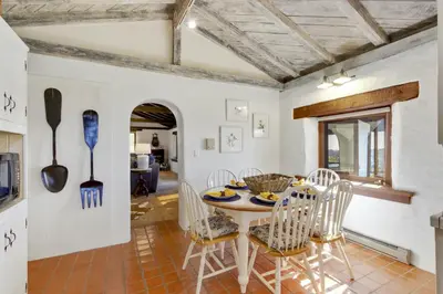 a dining room with a table and chairs at North County Oasis in Vista