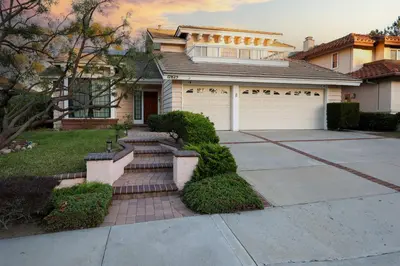a house with a driveway and a garage at Hilltop Escape in Carmel Valley in San Diego