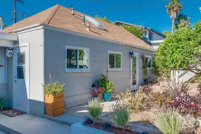 a small house with plants in front of it at Comfy Bay Park Cottage close to Everything! in San Diego