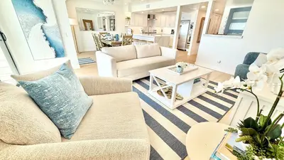 a living room with a couch and a table at Location! Location! Location! Walk Everywhere! in Oceanside